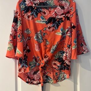 Peach floral button down tie longer in the back blouse